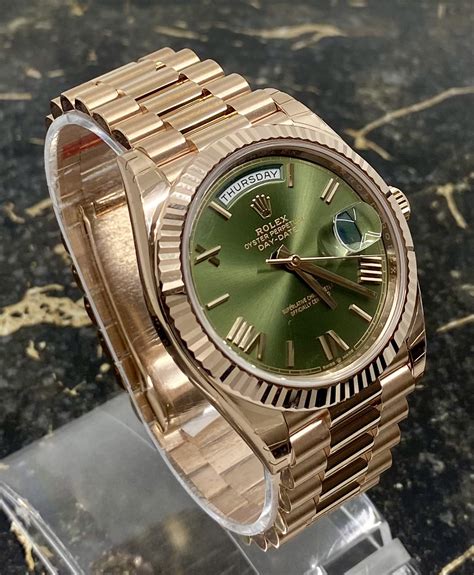 rolex rose gold green dial.